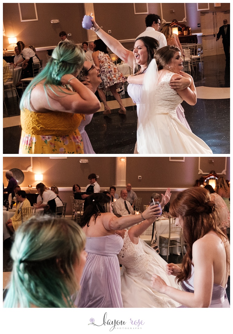 Bride's friend tackling her on the dance floor