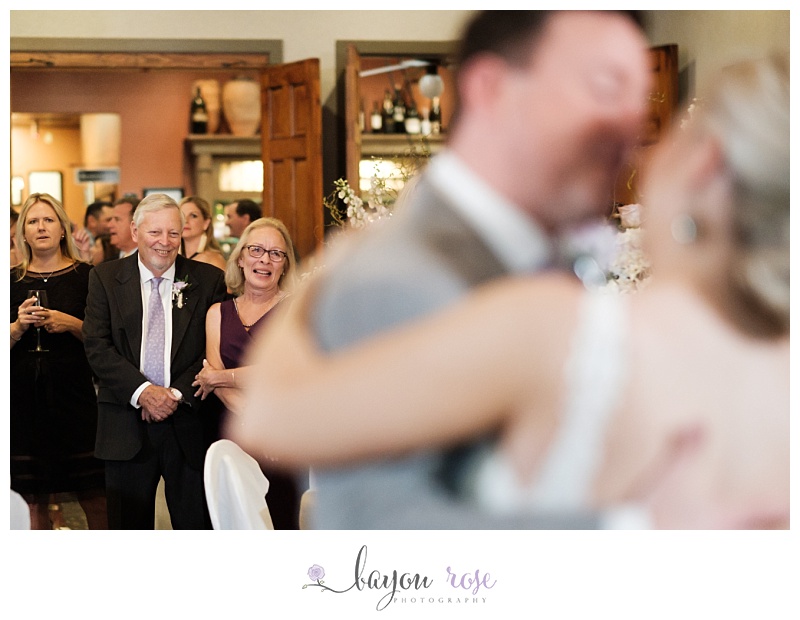 Parents watch first dance of bride and groom