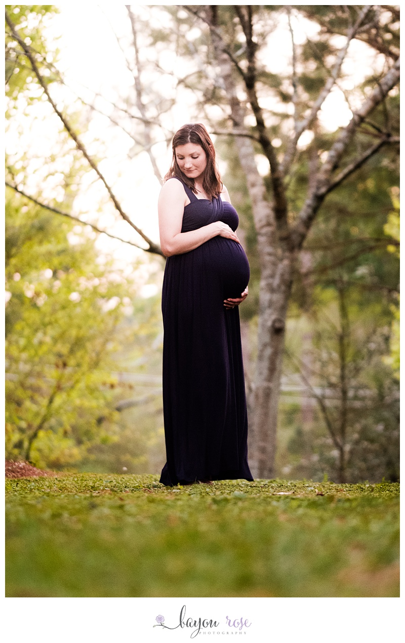 pregnant woman on hill