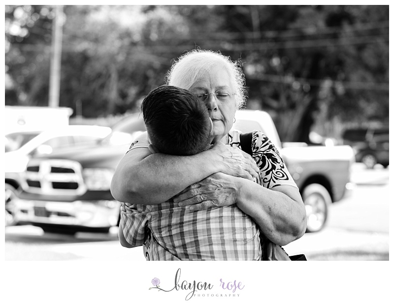 grandma hugs boy emotionally