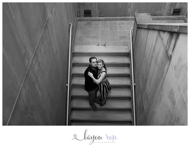 Black and white photo of couple on stairway