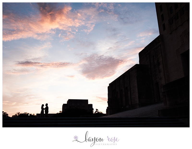 silhouette image of couple on steps of capitol at sunset in downtown Baton Rouge