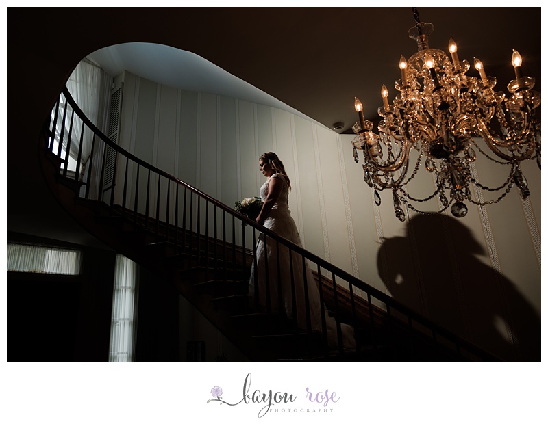 Woman on staircase in wedding dress