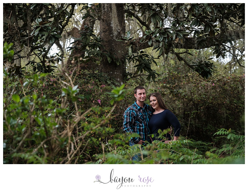 couple smiling in trees at Rosedown Plantation