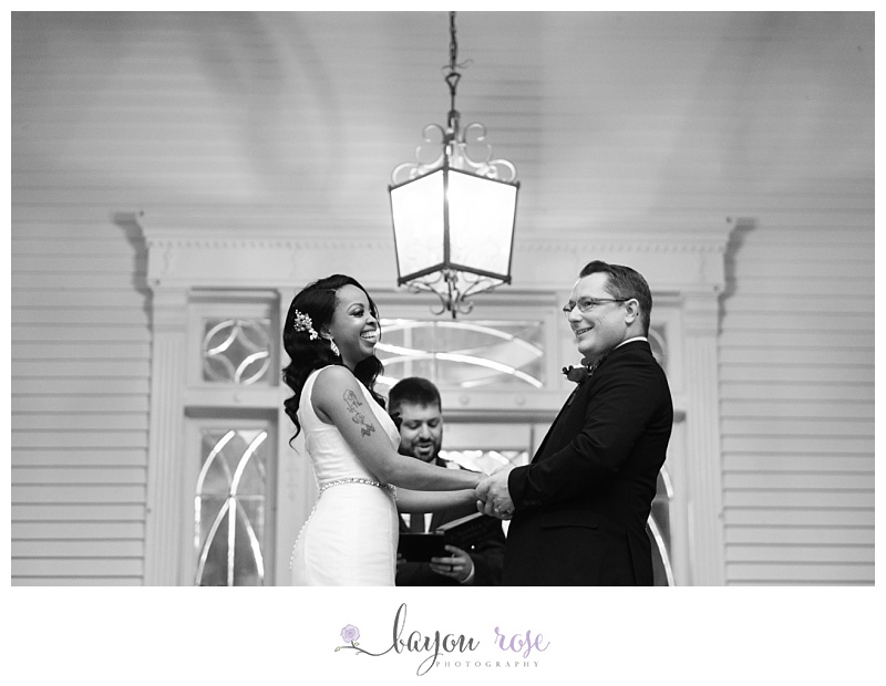 Bride and groom laughing during ceremony at Blythewood Plantation