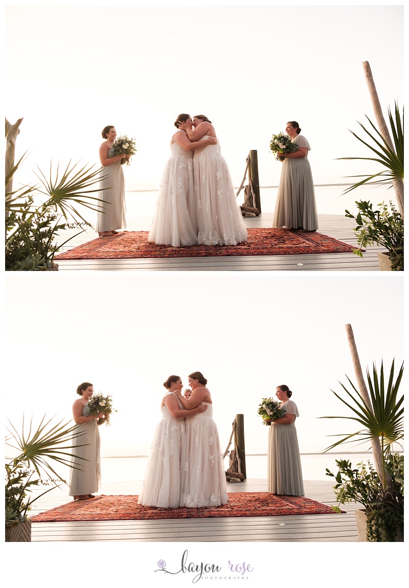 LGBTQ brides exchanging first kiss