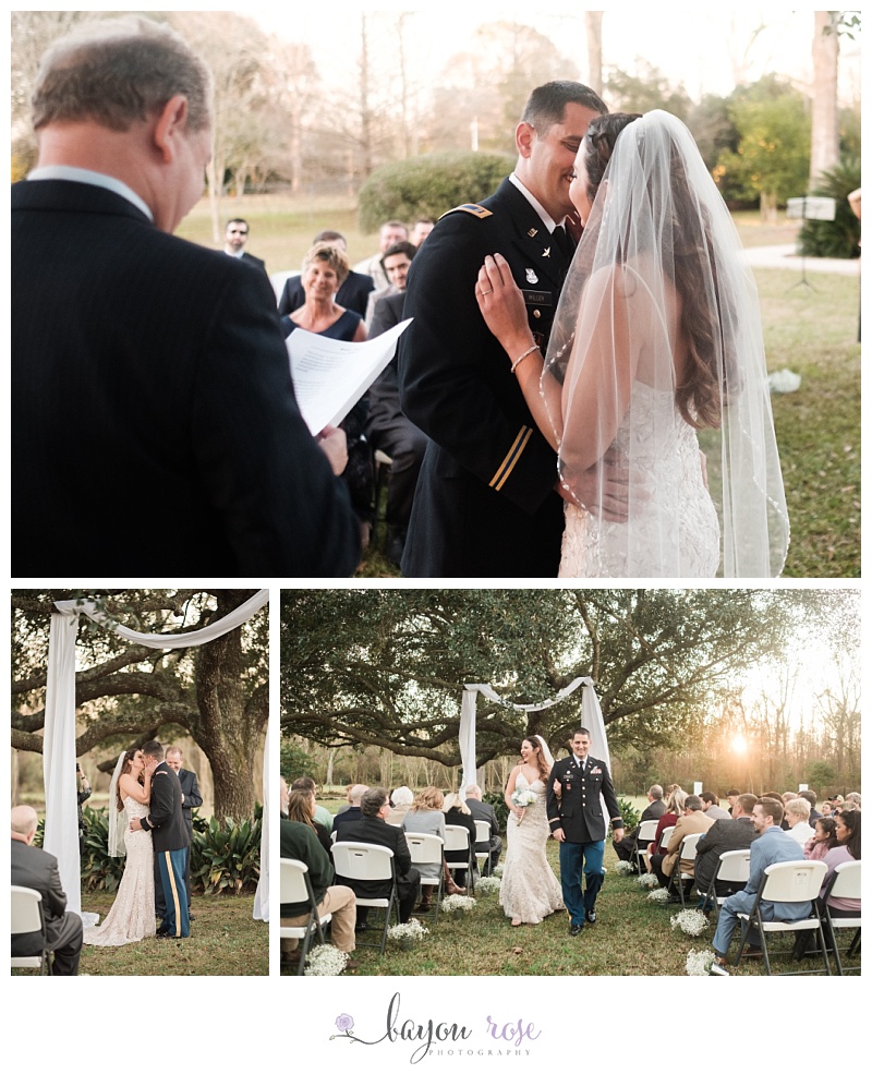 bride and groom first kiss in backyard wedding at sunset
