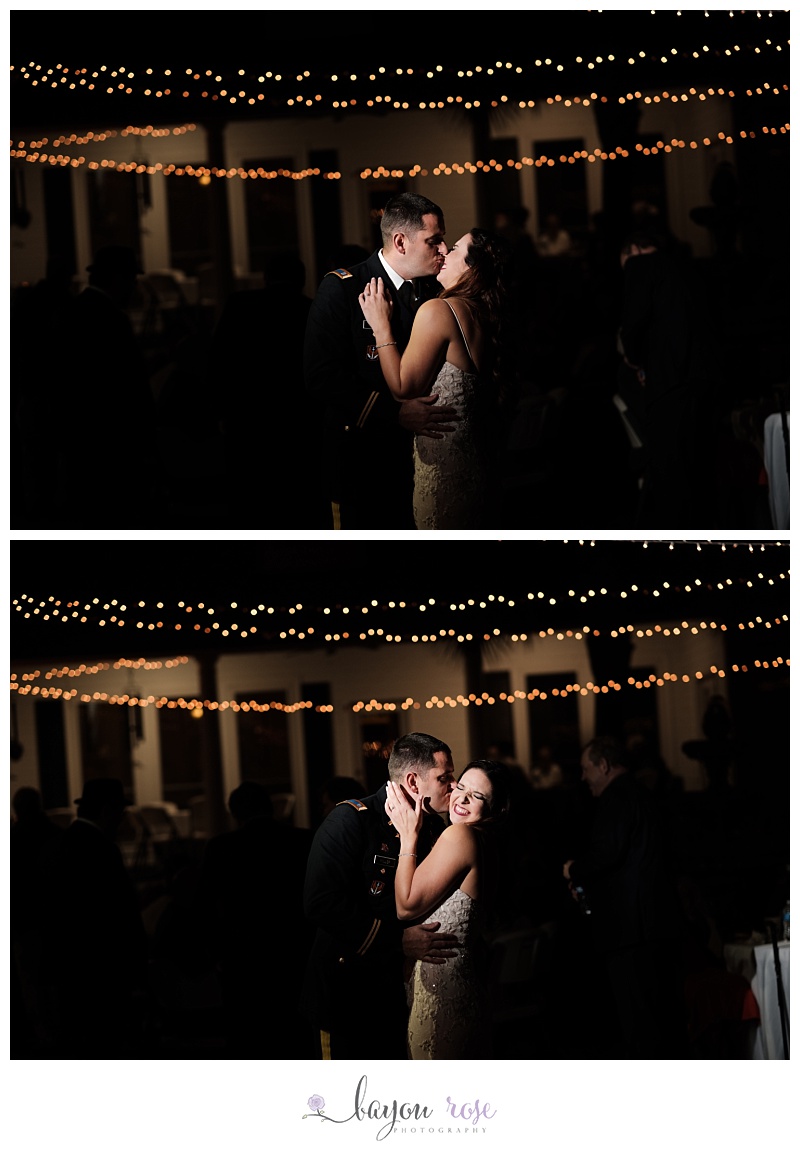 bride and groom kissing and laughing under string lights in outdoor backyard wedding in Baton Rouge