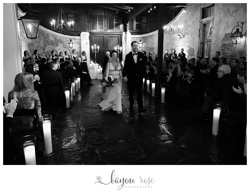 bride and groom come down aisle at Latrobe's