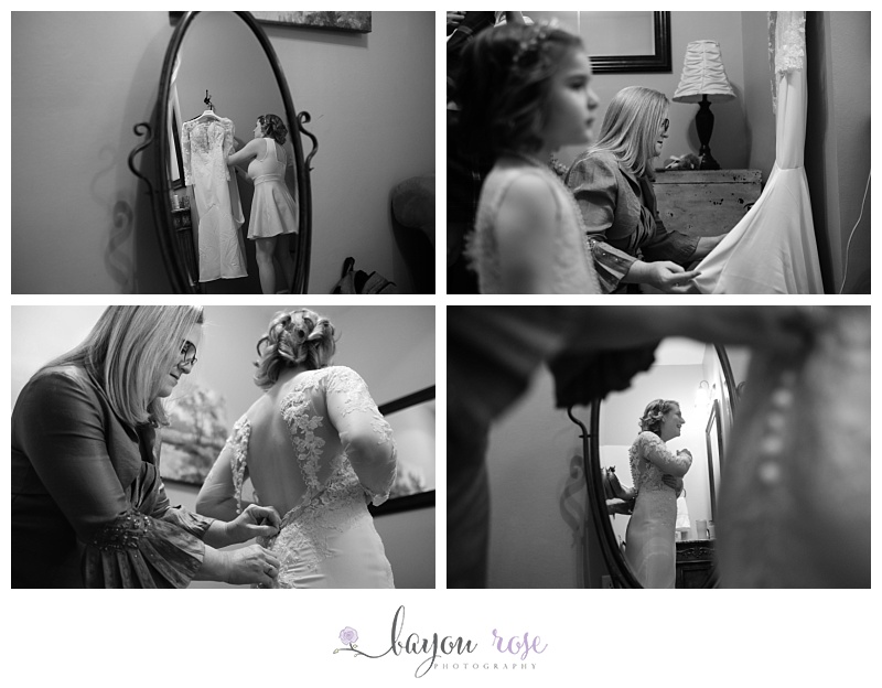 Bride getting into her wedding dress at The Gatehouse in Baton Rouge