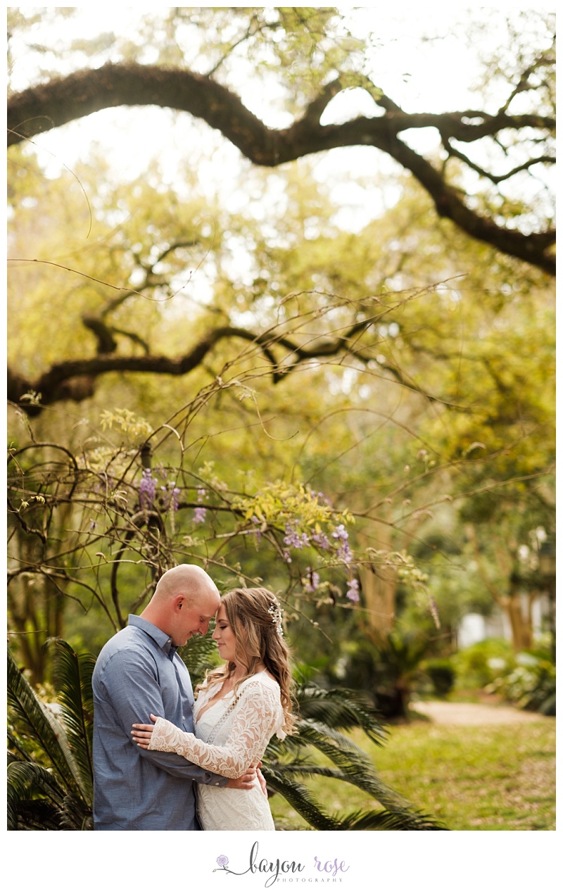 Wedding couple under oak tree at Windrush gardens in Baton Rouge