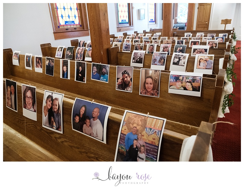 church pews with guest photos taped to them during social distance wedding