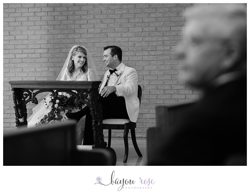 Bride and groom laughing together in photo taken by a Baton Rouge elopement photographer