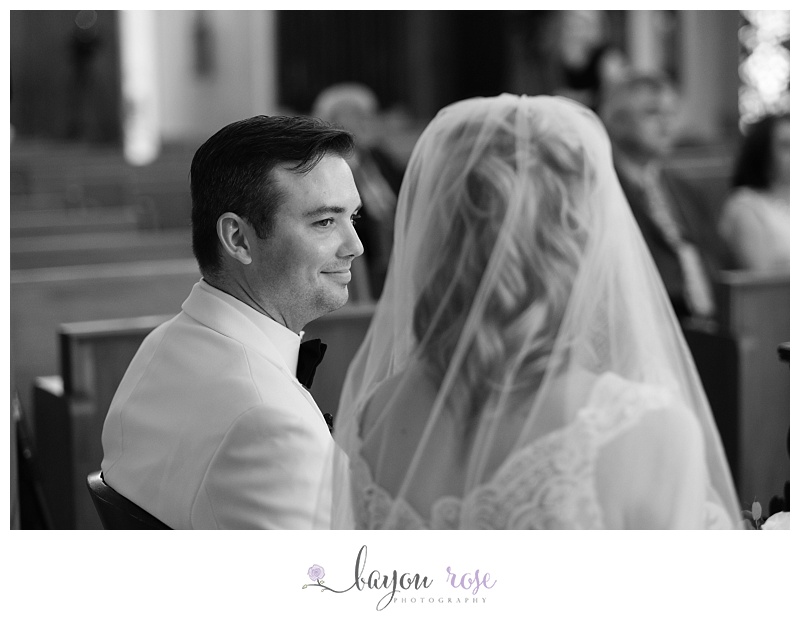 groom gazes at bride lovingly