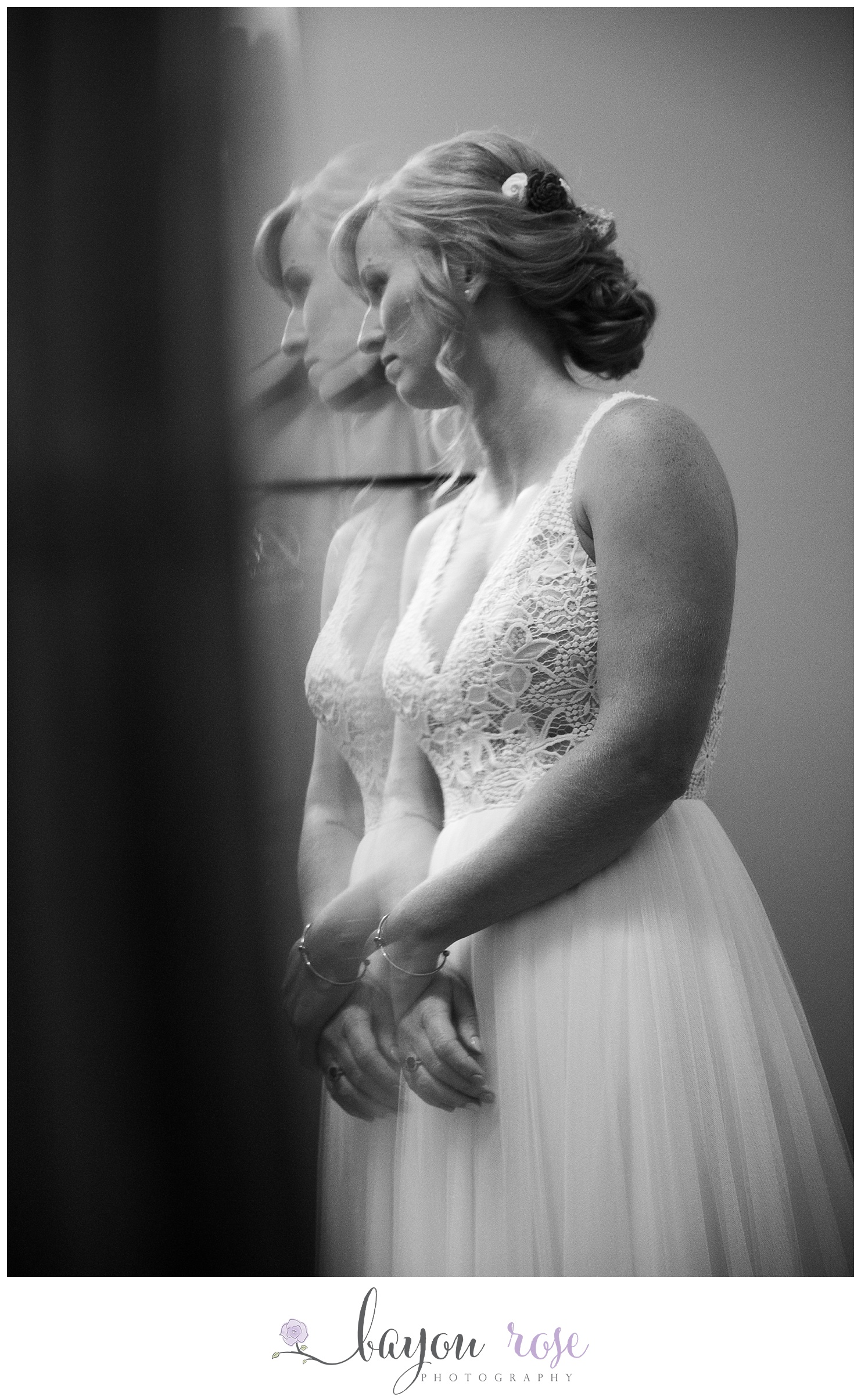 Artistic photo of bride reflected in beveled mirror