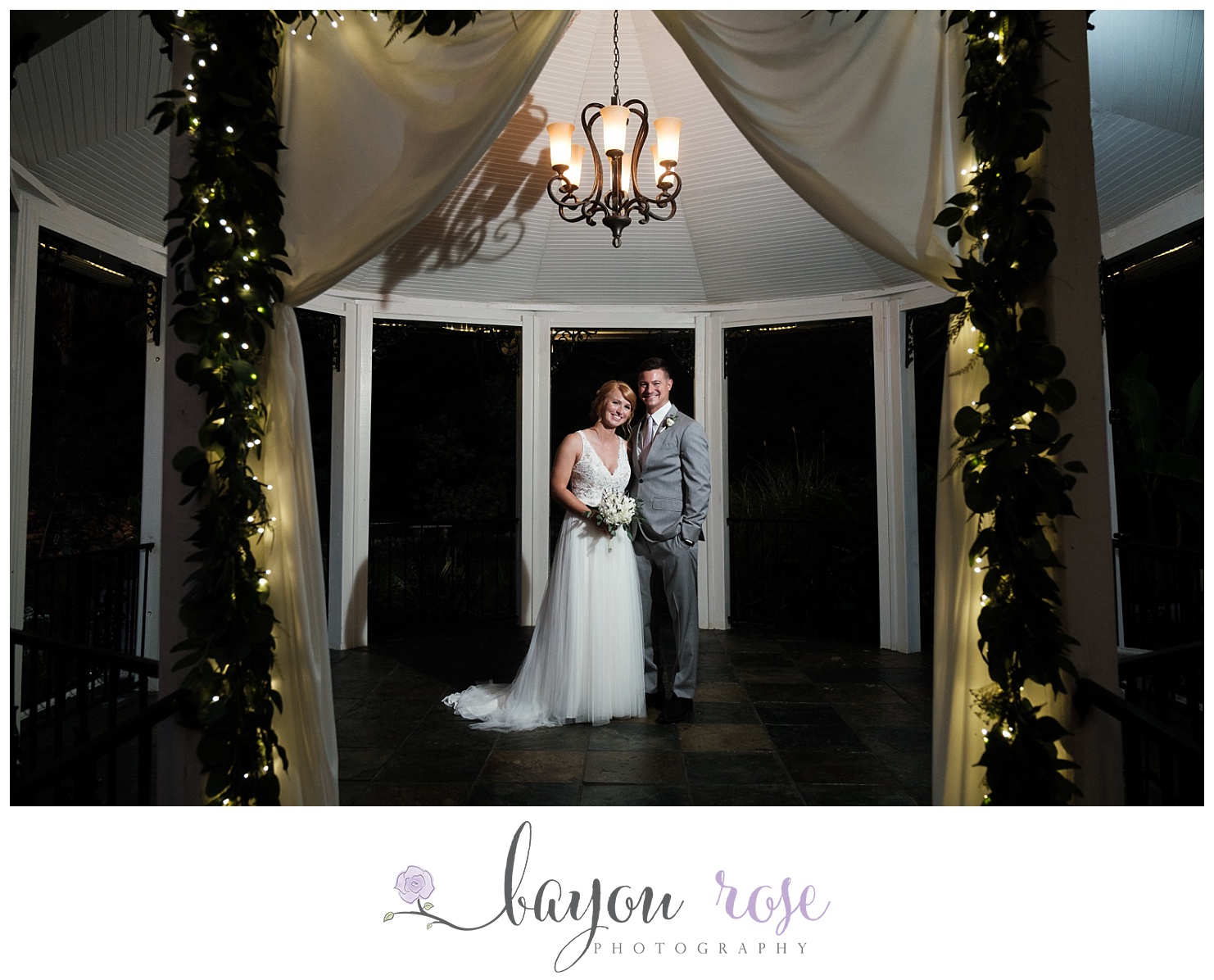 Bride and groom portrait under the gazebo at The Gatehouse