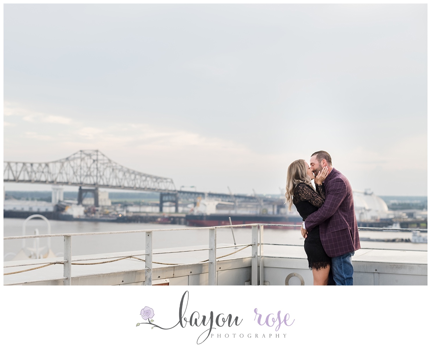 Proposal photography session in Baton Rouge with Mississippi bridge in background