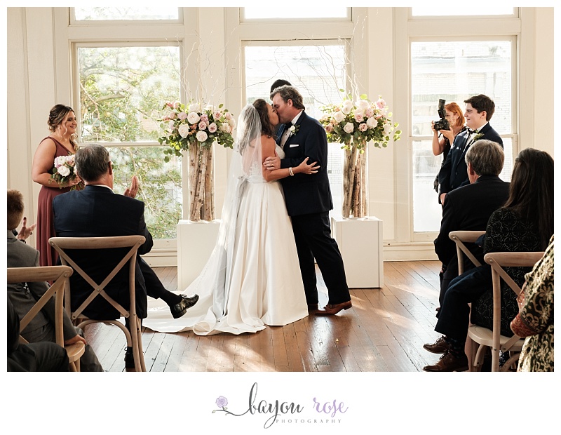 first kiss at The Trademark Baton Rouge wedding