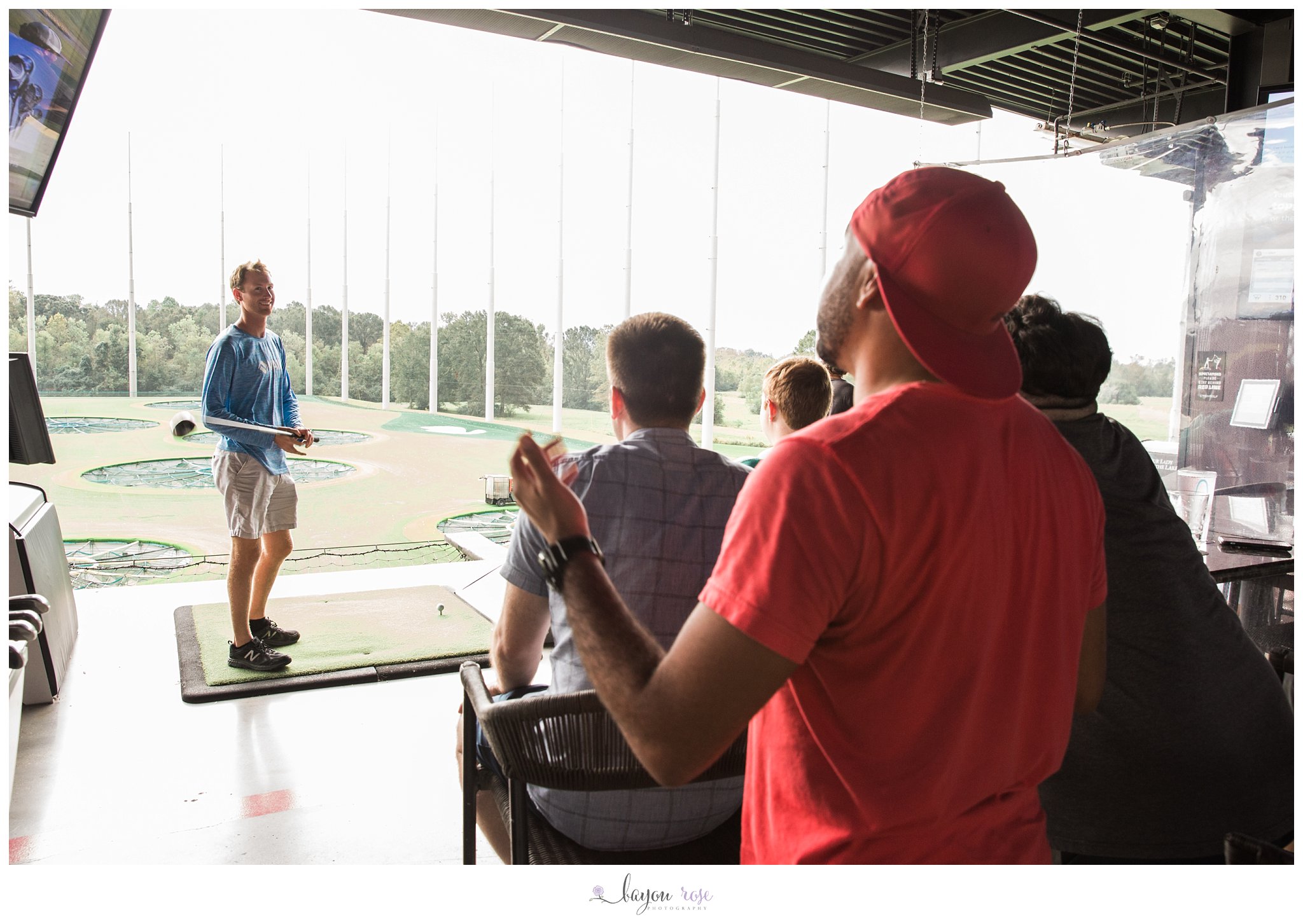 Groom at Top Golf on his wedding day