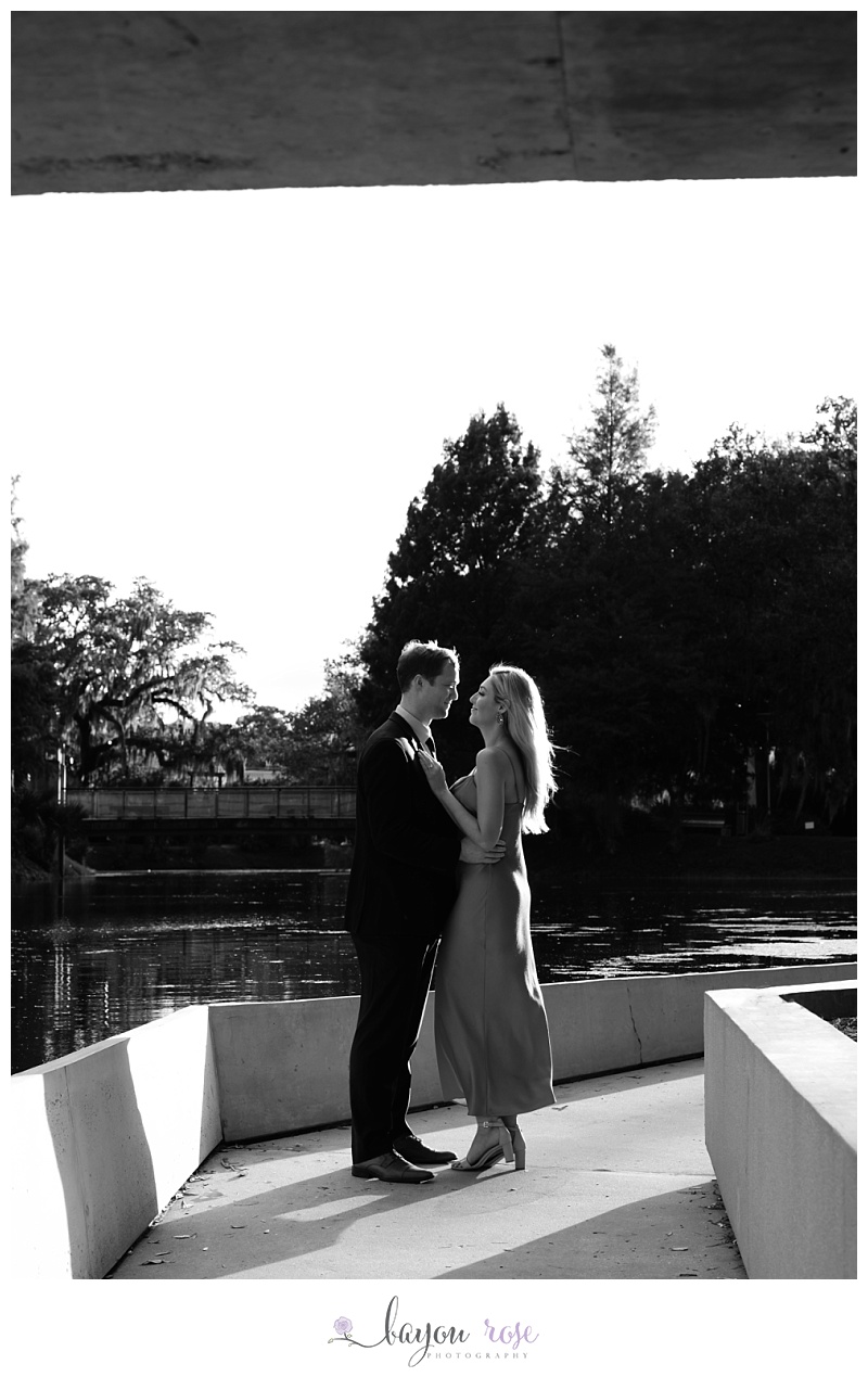 black and white silhouette image of engaged couple at New Orleans Museum of Art
