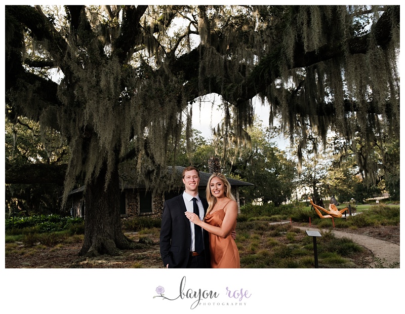 Proposal photo under spanish moss at Sculpture Garden in New Orleans