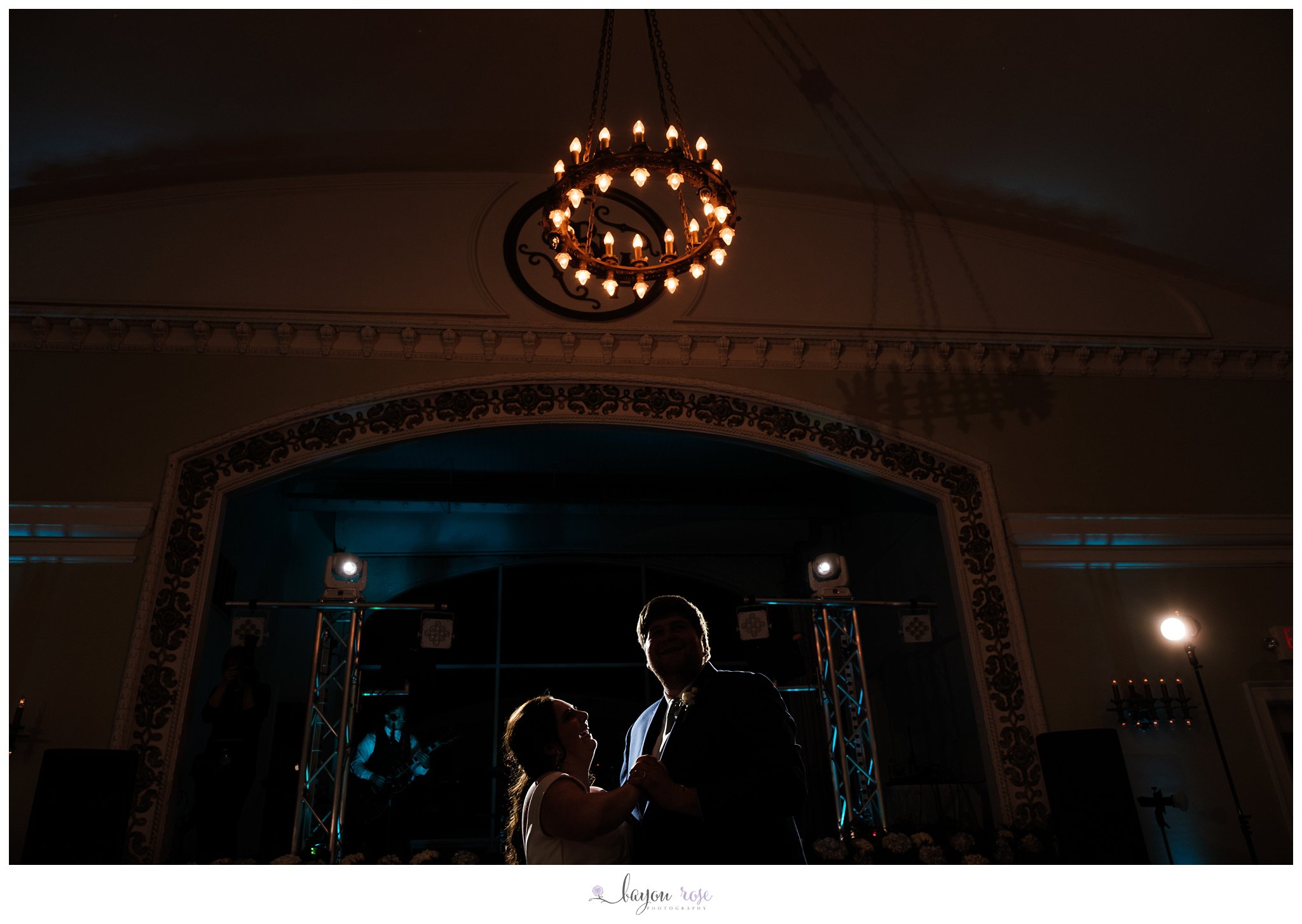 bride and groom silhouette during first dance