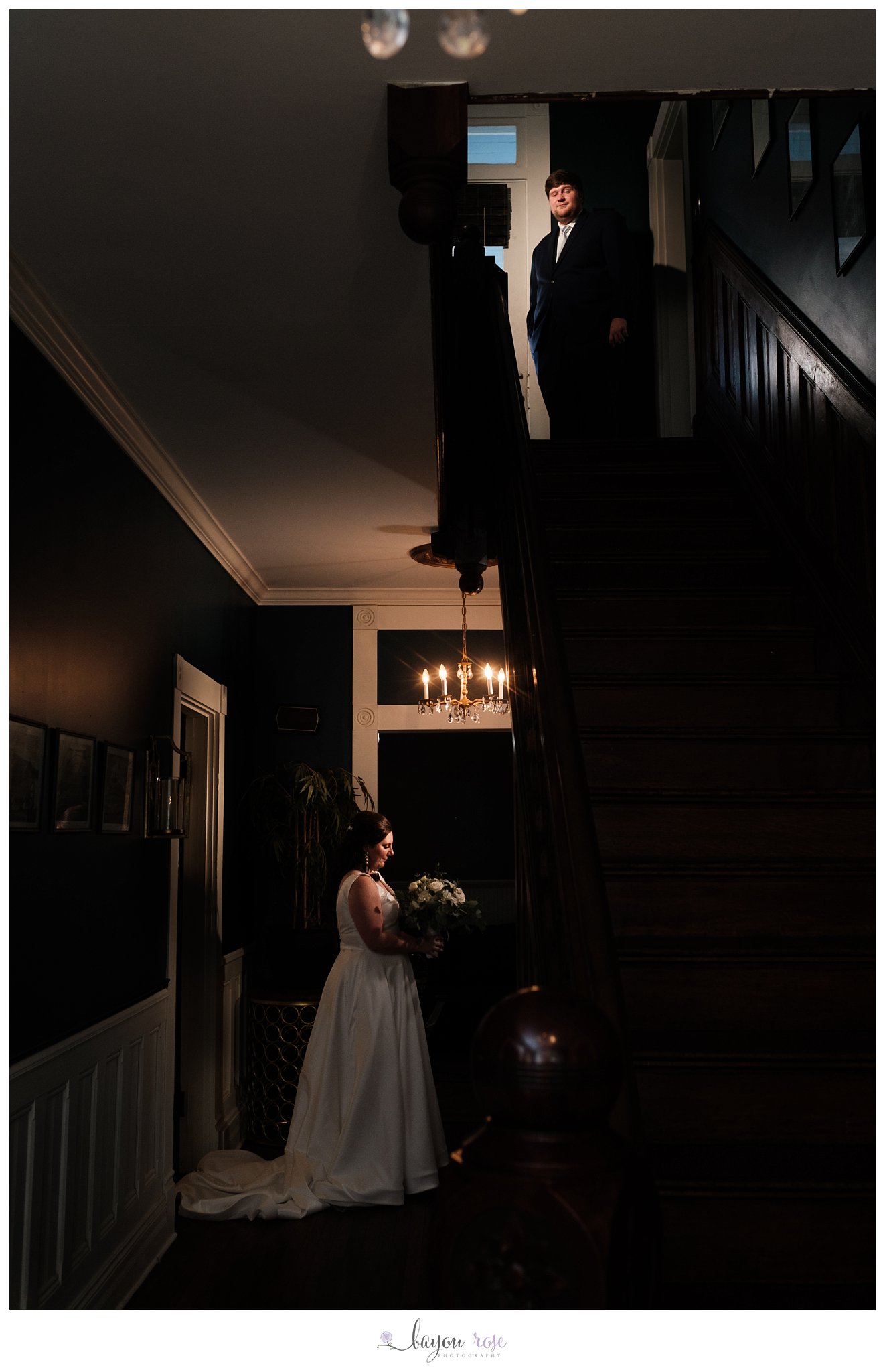 artistic bride and groom photo on staircase
