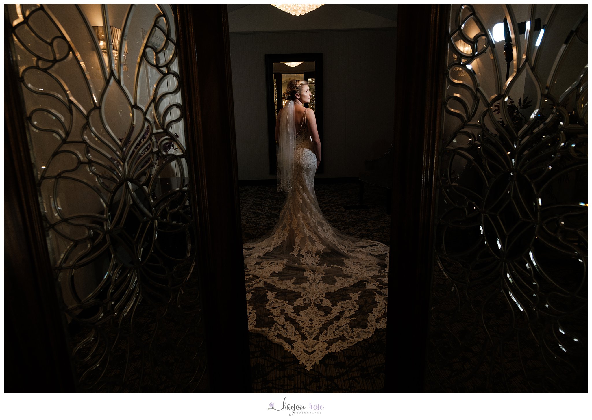 Bride framed in doorway of The Oaks Ponchatoula