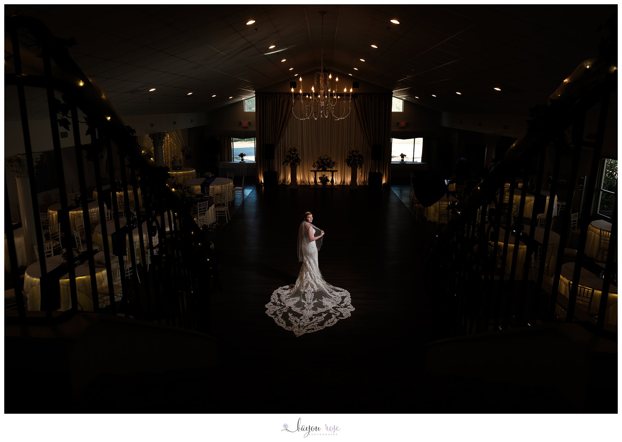 Bride at end of staircase at The Oaks Ponchatoula