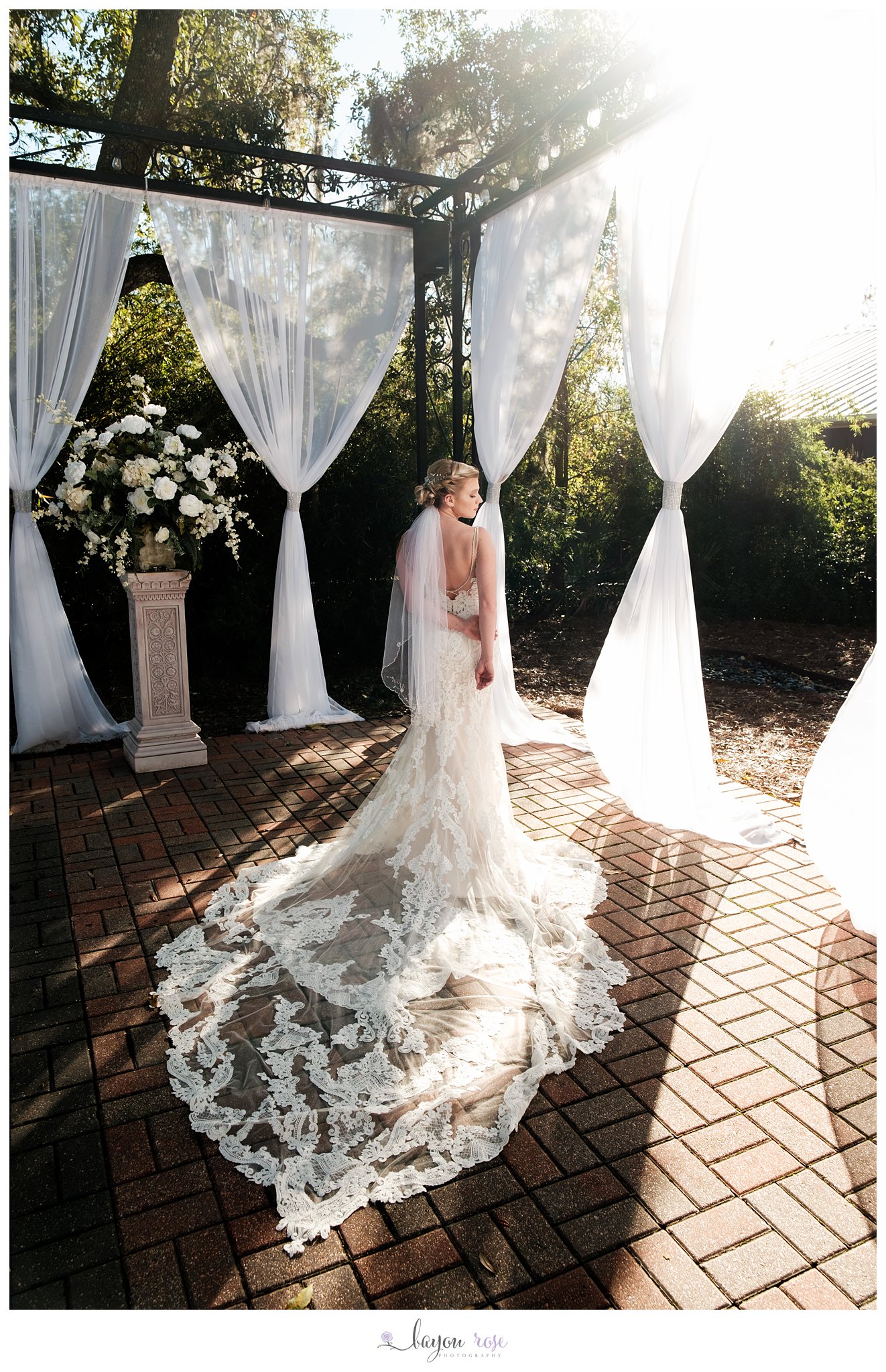 sun flare and beautiful bridal photo at The Oaks Ponchatoula