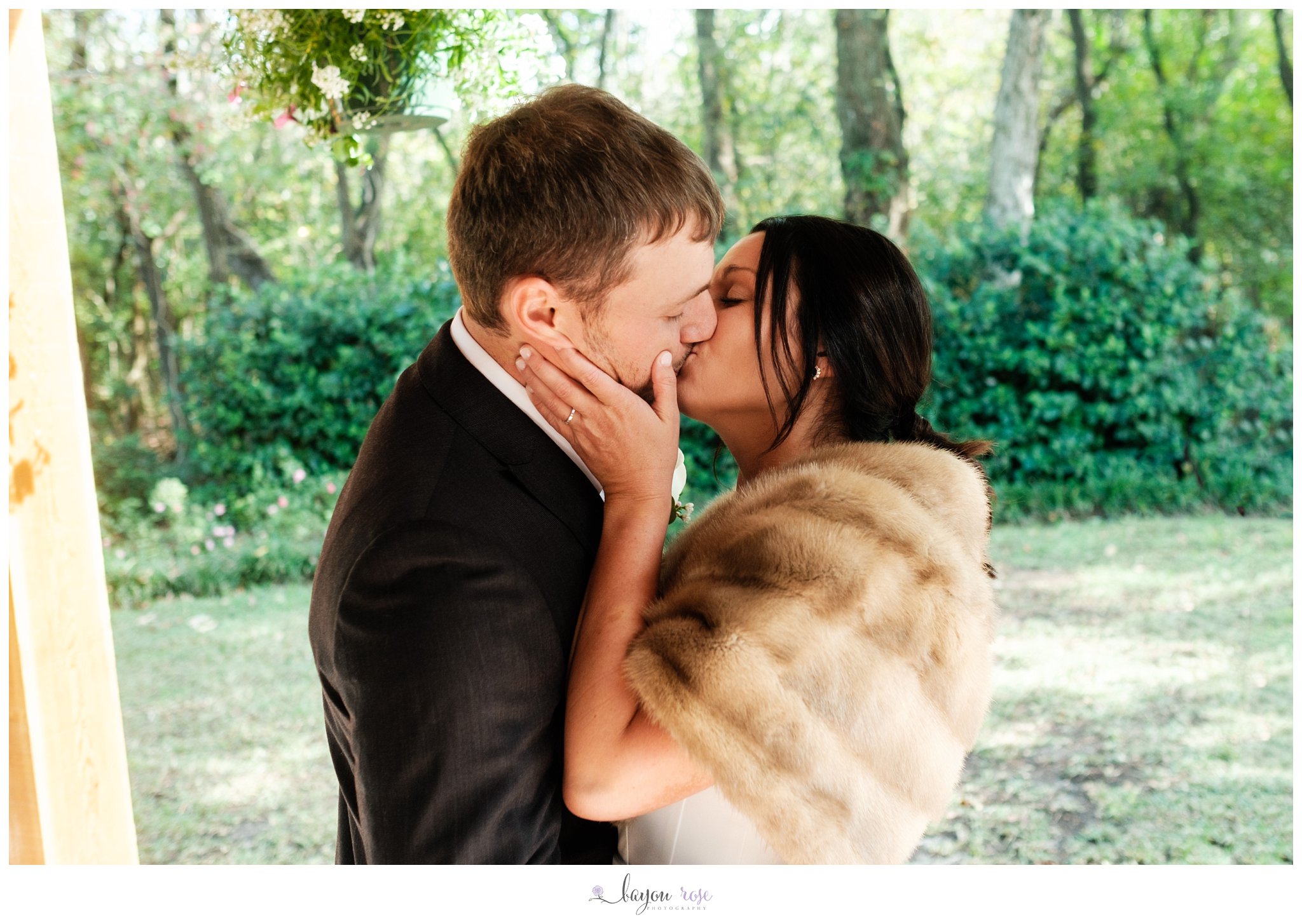 first kiss after backyard elopement in Baton Rouge