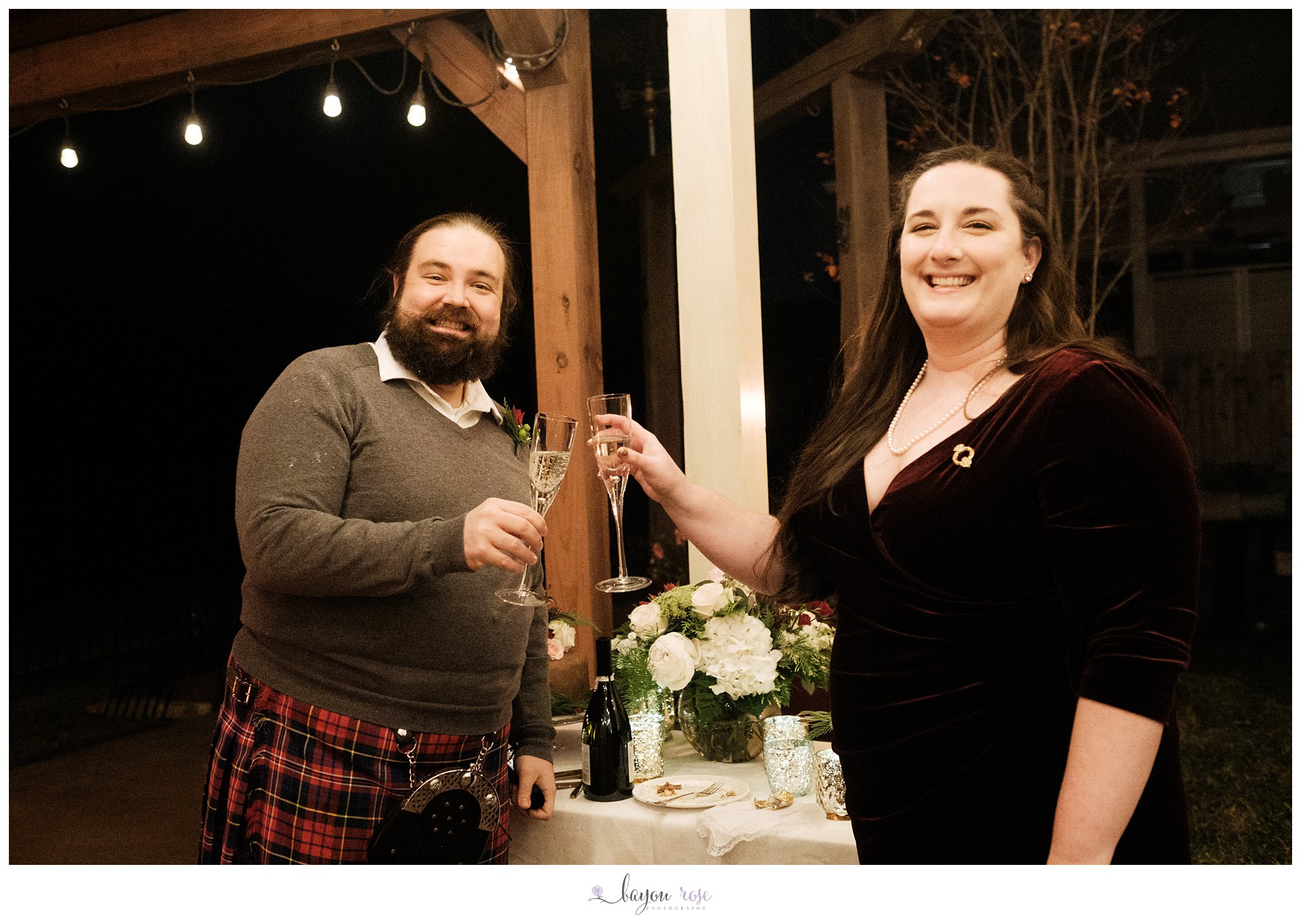 Baton Rouge elopement photography bride and groom toasting with champagne