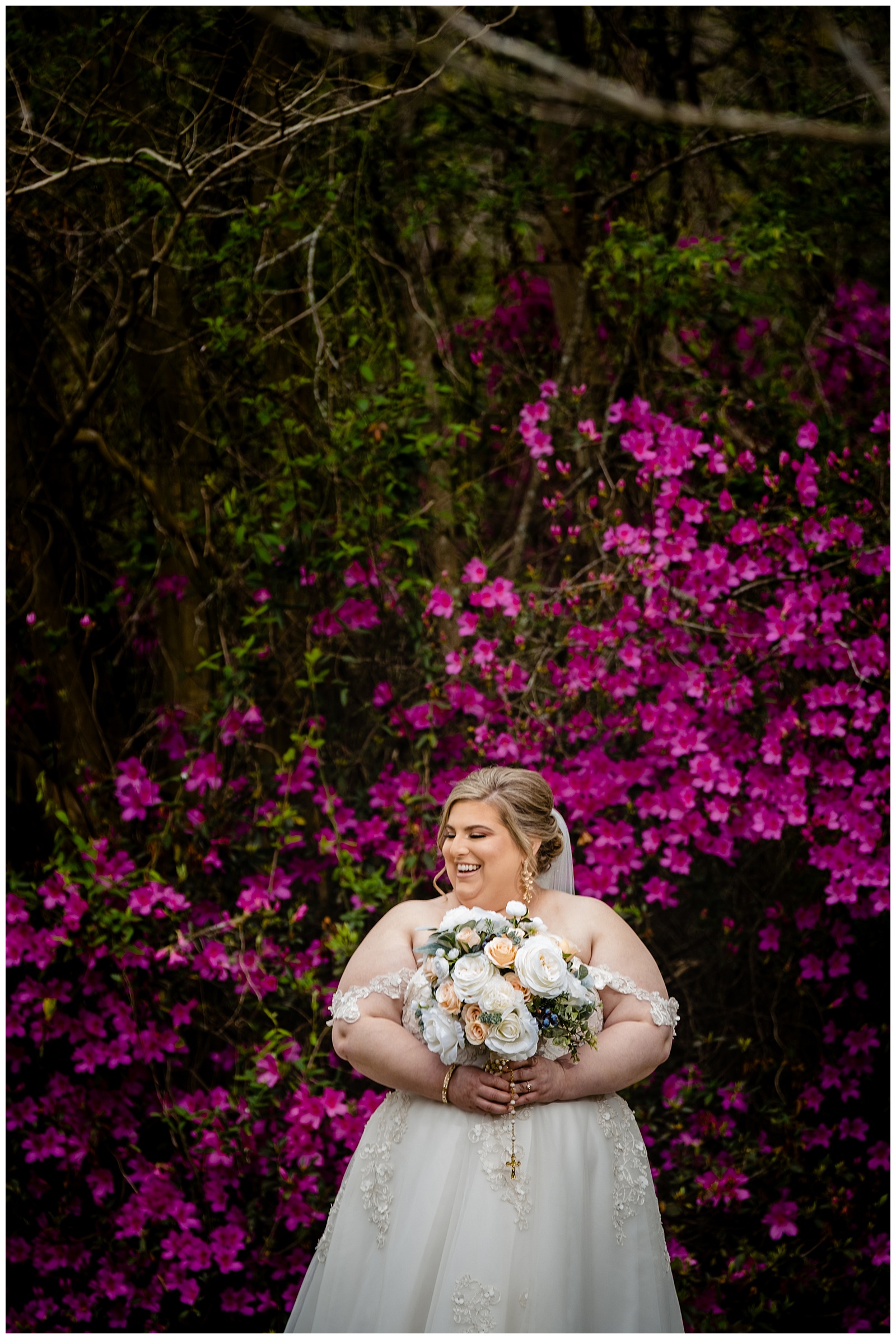 bride holding wedding bouquet posing for bridal photo