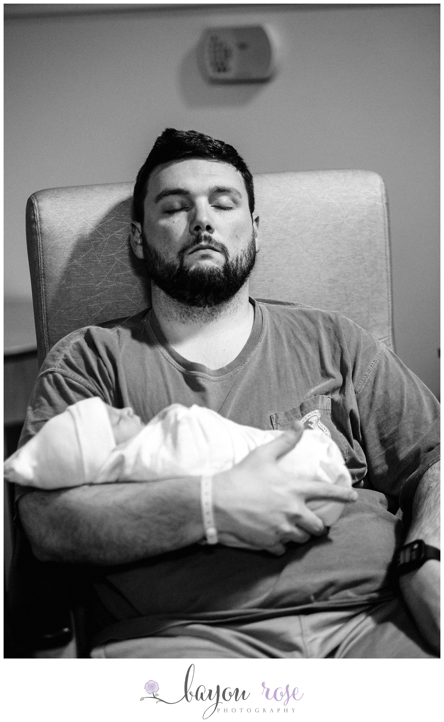 dad sleeping after newborn boy's birth
