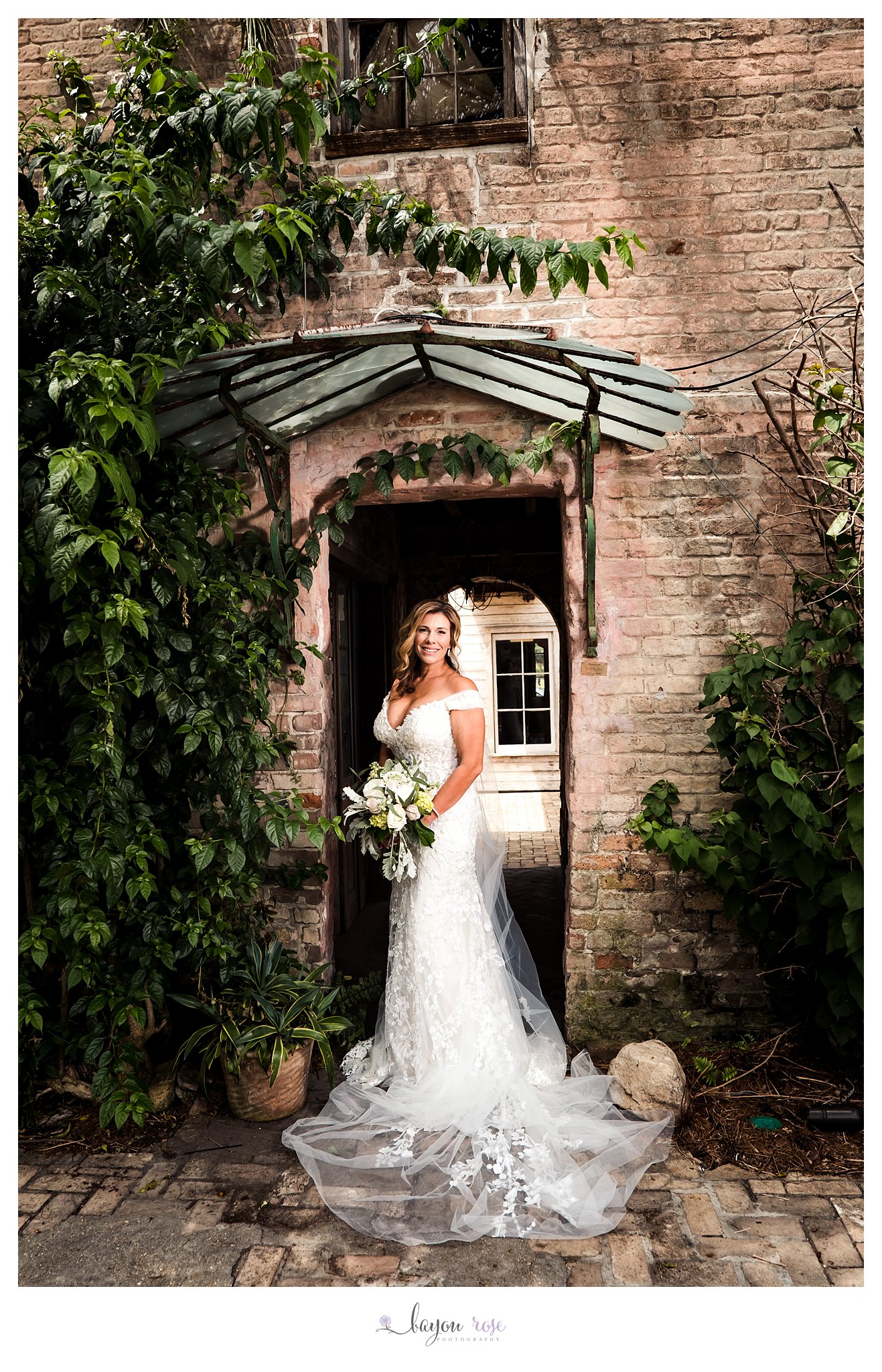 bride in courtyard of Race and Religious for bridal photo session