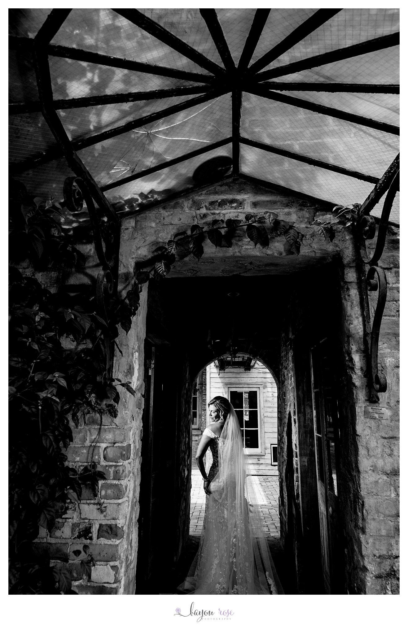dramatic bridal photo in courtyard of Race and Religious