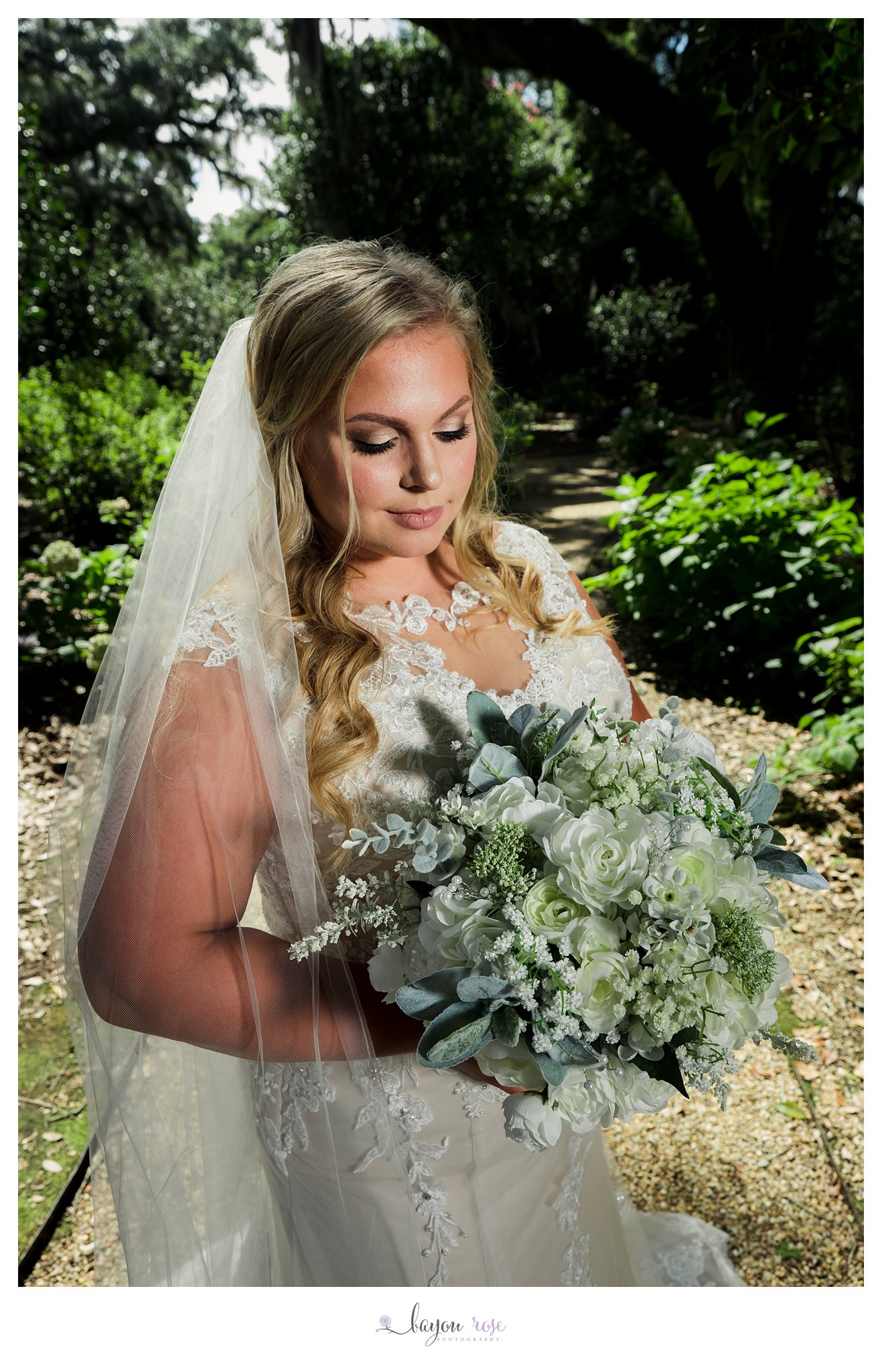 Photo of bride holding bridal bouquet