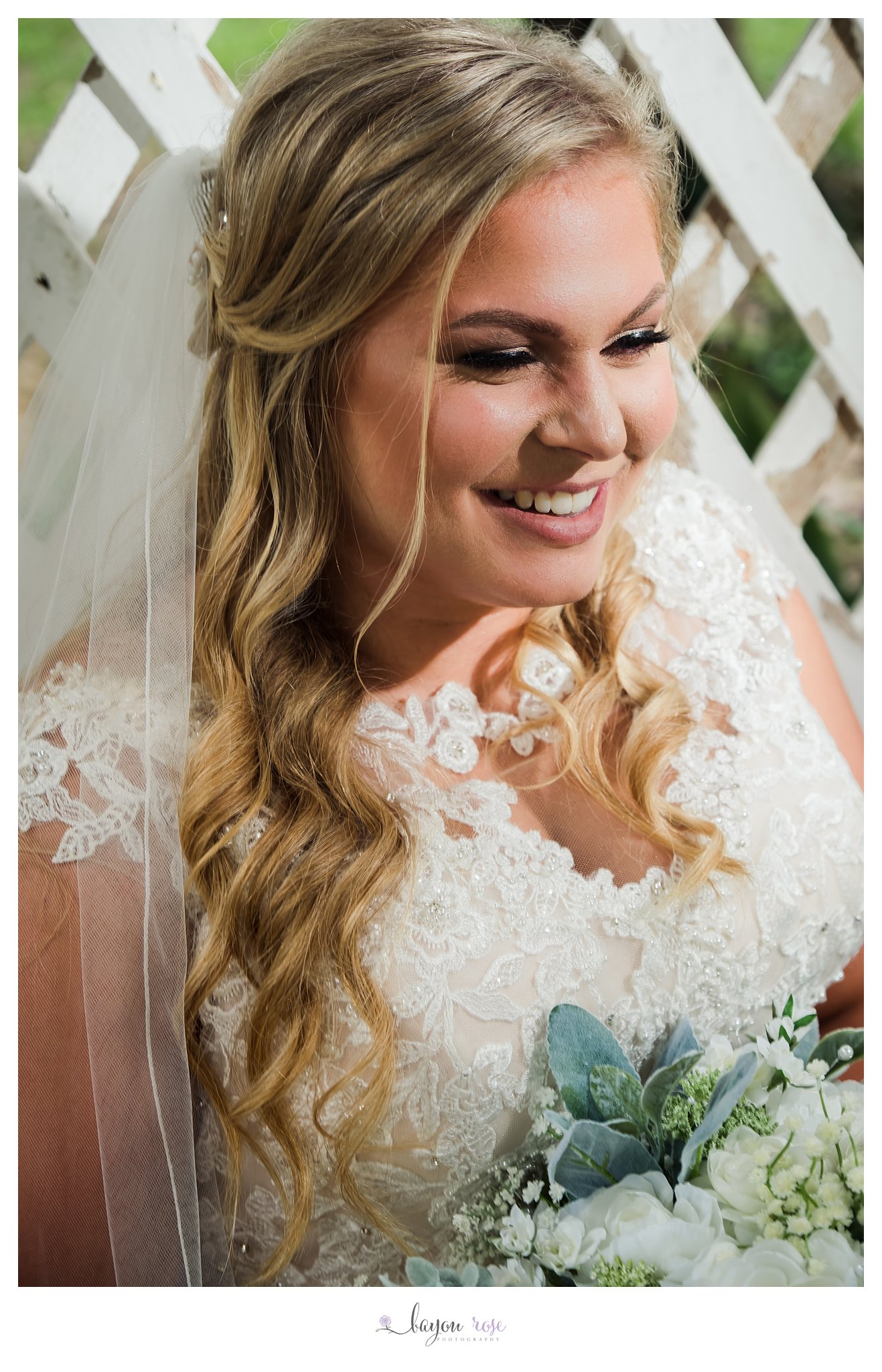 Close up photo of bride laughing in bridal photo