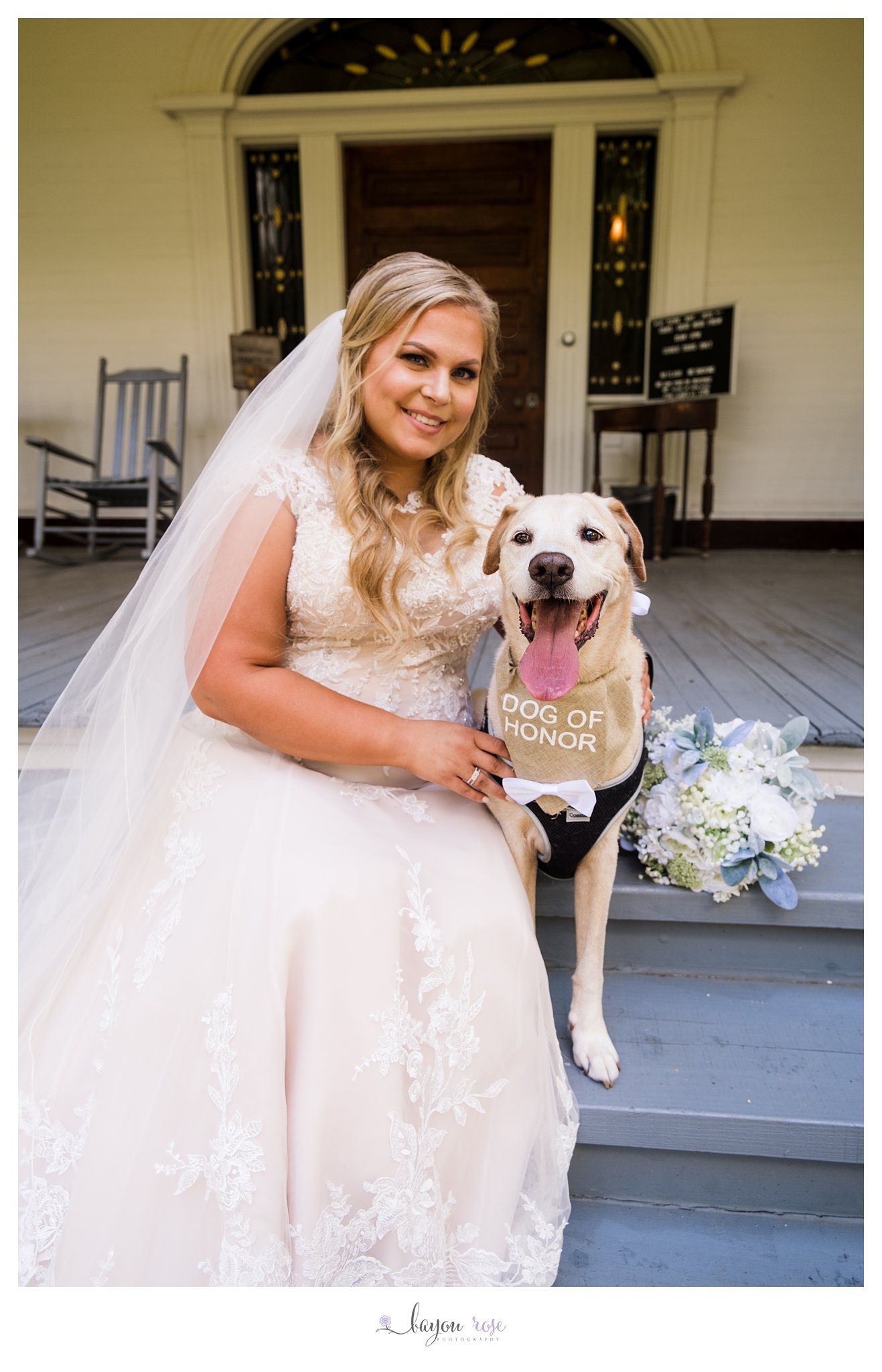 Bride with dog on steps of Rsedown