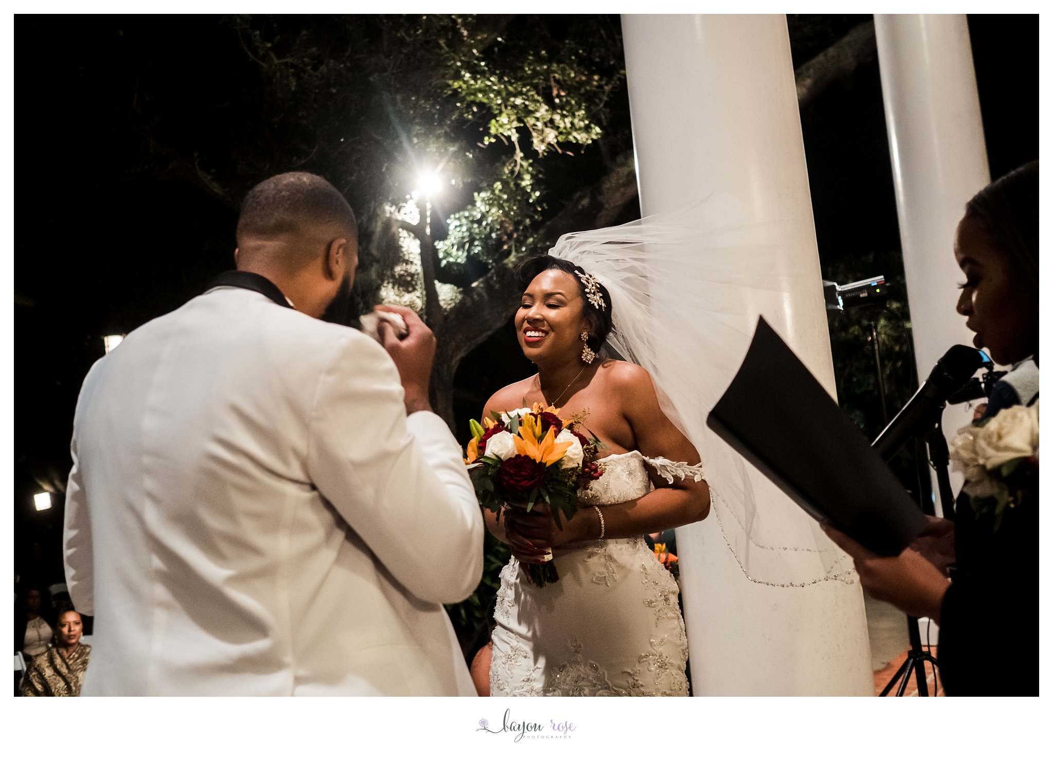 emotional bride and groom during Southern Oaks wedding ceremony